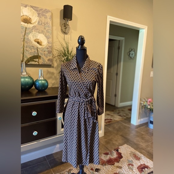 connected apparel Dresses & Skirts - Faux wrap dress.  Black and gold chain design.  Size 10.  Length 40”.